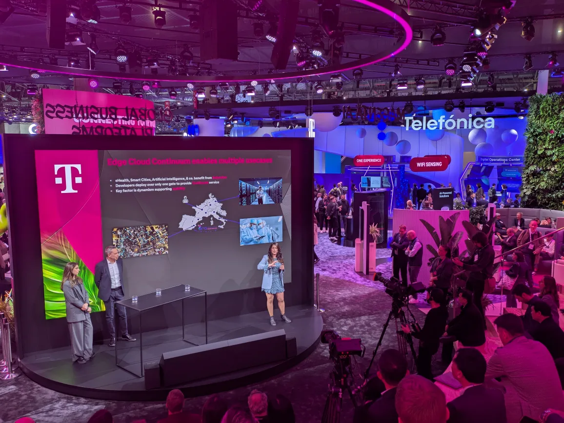 presenters and audience at the Telekom stage at mobile world congress 2025